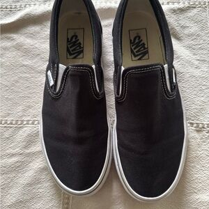 Vans Classic Black and White Slip-Ons